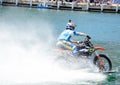 WaterBike ride by Robbie Maddison Australian stunt rider, the image shows how to ride his dirt bike on water in action. Royalty Free Stock Photo